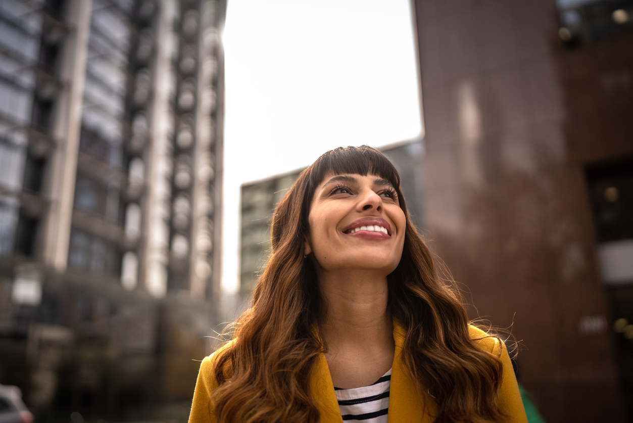 Woman looking up and smiling